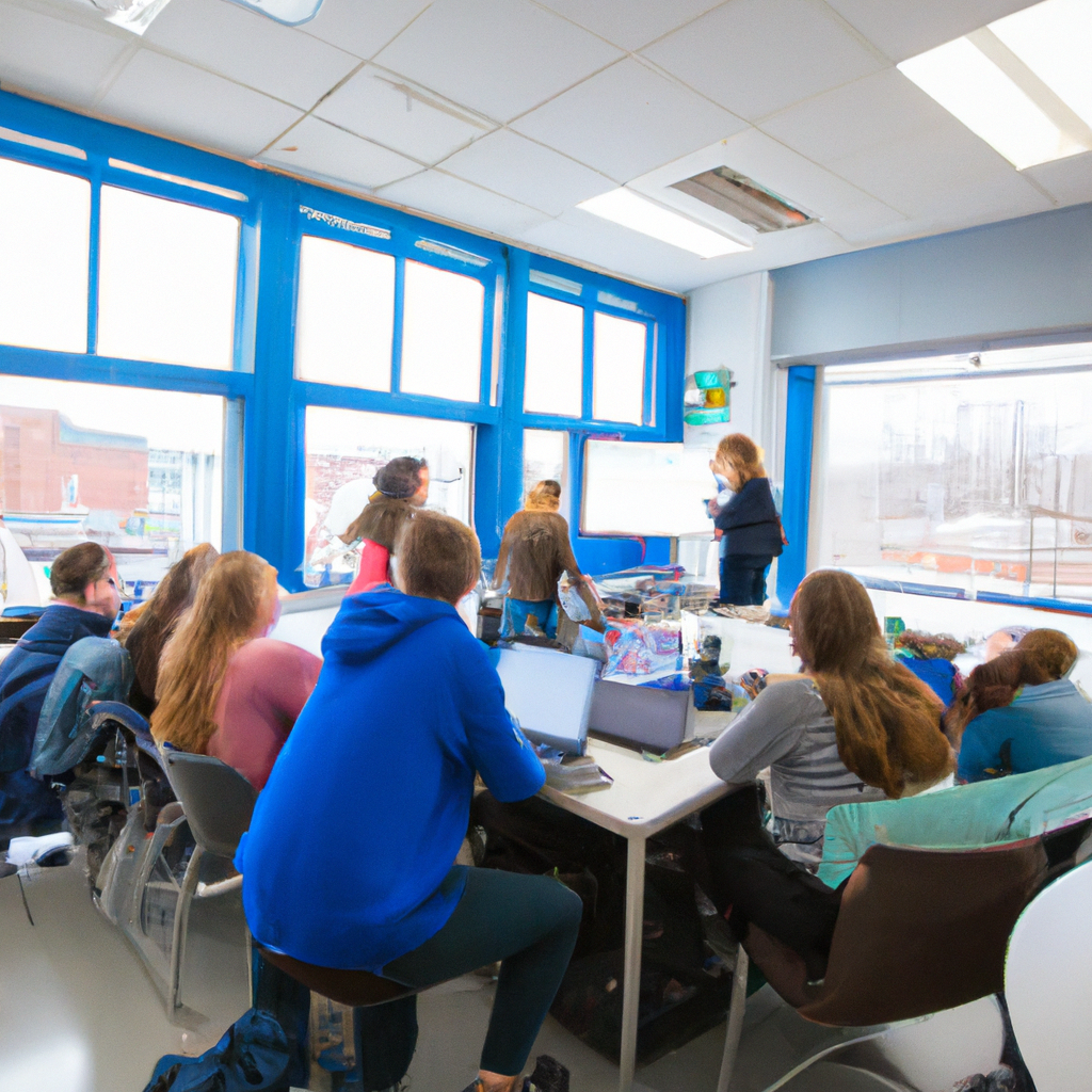 Students at Lakeshore Time Academy collaborating with laptops in a bright modern classroom